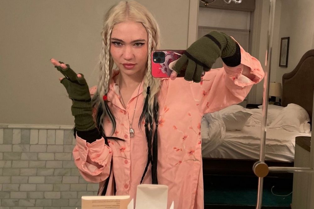Grimes Admits Hacking